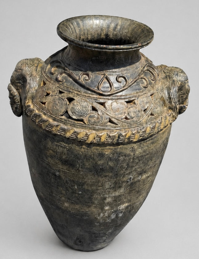 Terracotta Vase with Elephant Head Motifs